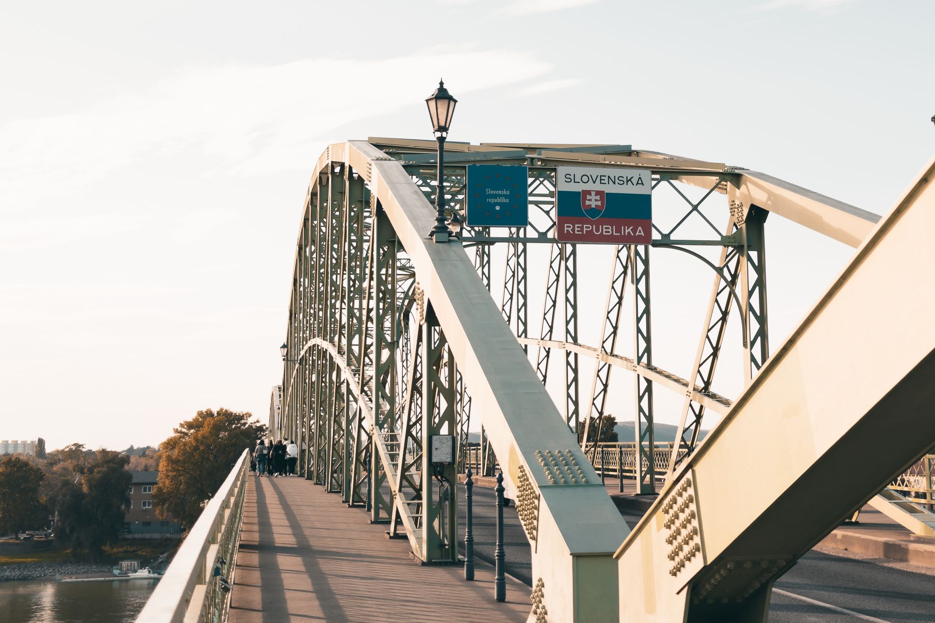 A scenic view of Maria Valeria Bridge connecting Hungary and Slovakia over the Danube River.. Photo by Ozan Tabakoğlu on Pexels