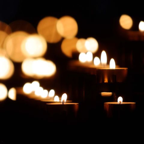 Warm candlelight and golden bokeh in the dark — photo by Mohammad reza Fathian on Pexels