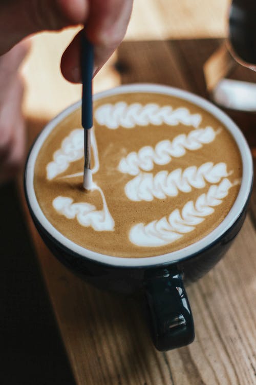 Free Black Teacup Filled by Brown Liquid Stock Photo