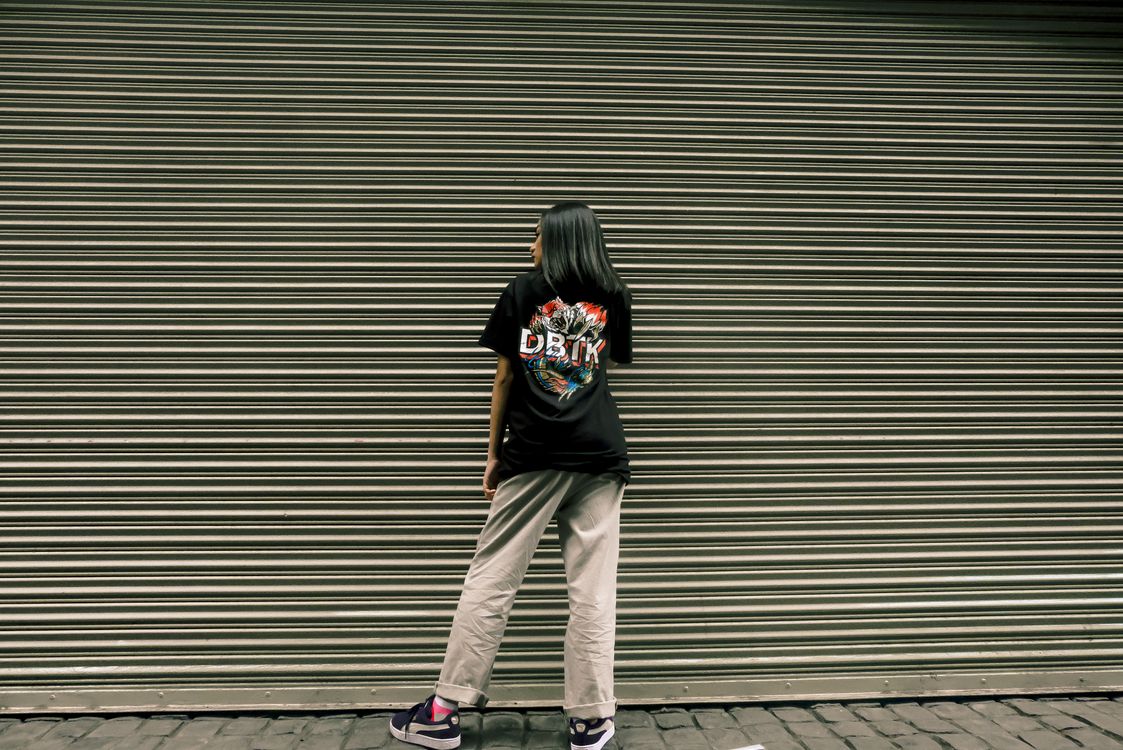 Free Woman Wearing Black Shirt Showing Back Stock Photo