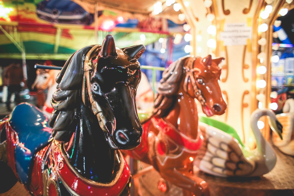 Free Closeup Photography of Brown and White Carousel Stock Photo