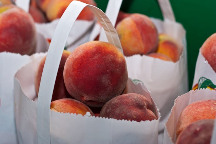 Pile Of Bags Of Peaches