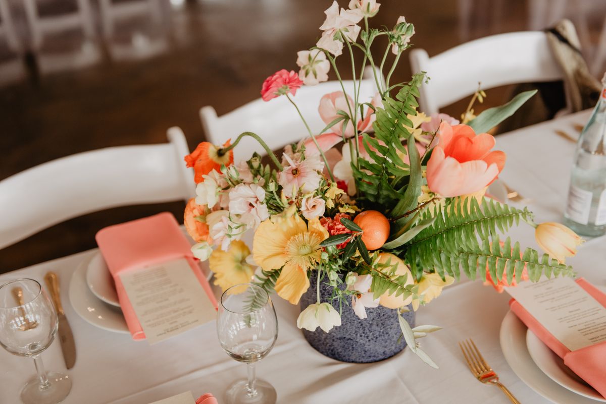 Charleston wedding reception tablescape with delicate floral centerpieces