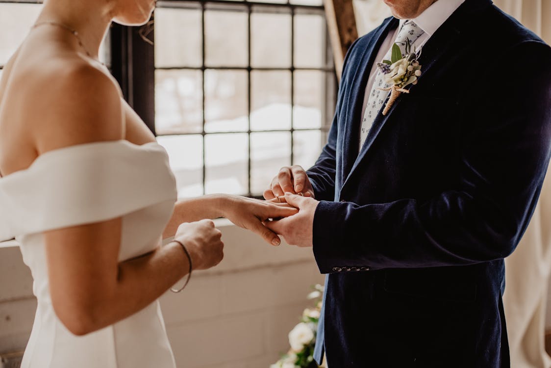 Free Woman And Man Holding Each Others Hands Stock Photo