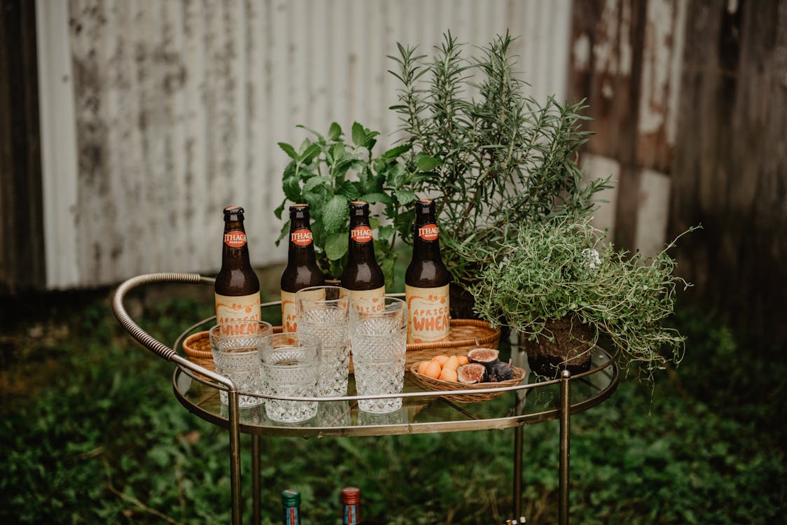 Free Four Beer Bottles On Cart Stock Photo