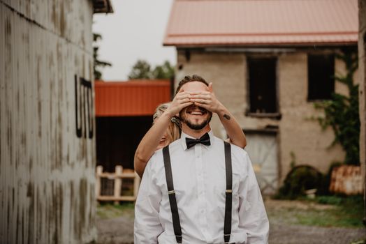 Woman Covering Man's Eyes