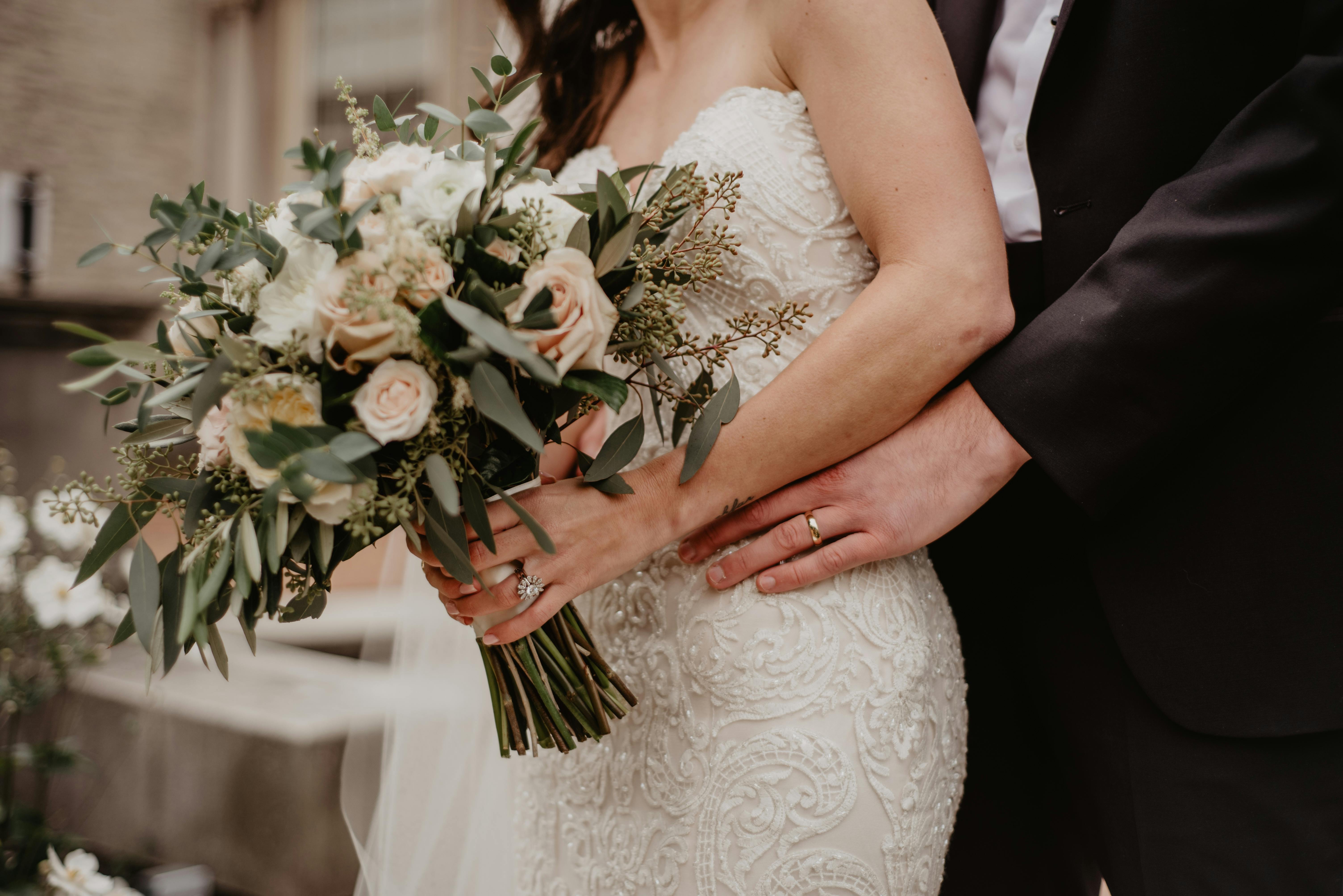 woman wearing white wedding gown