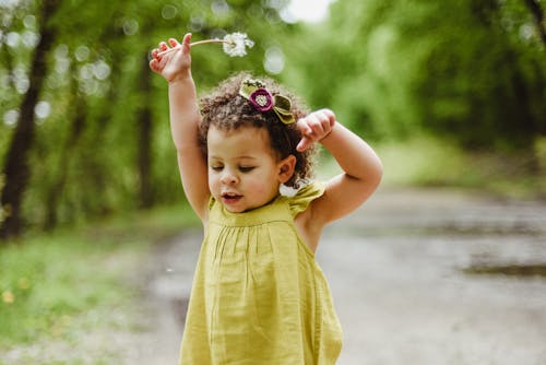 Free Baby Wearing Green Dress o Stock Photo