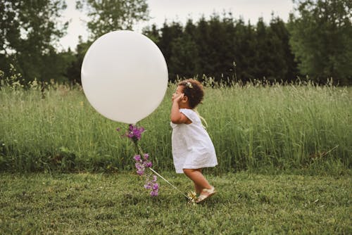Free Girl Playing With Balloon Stock Photo
