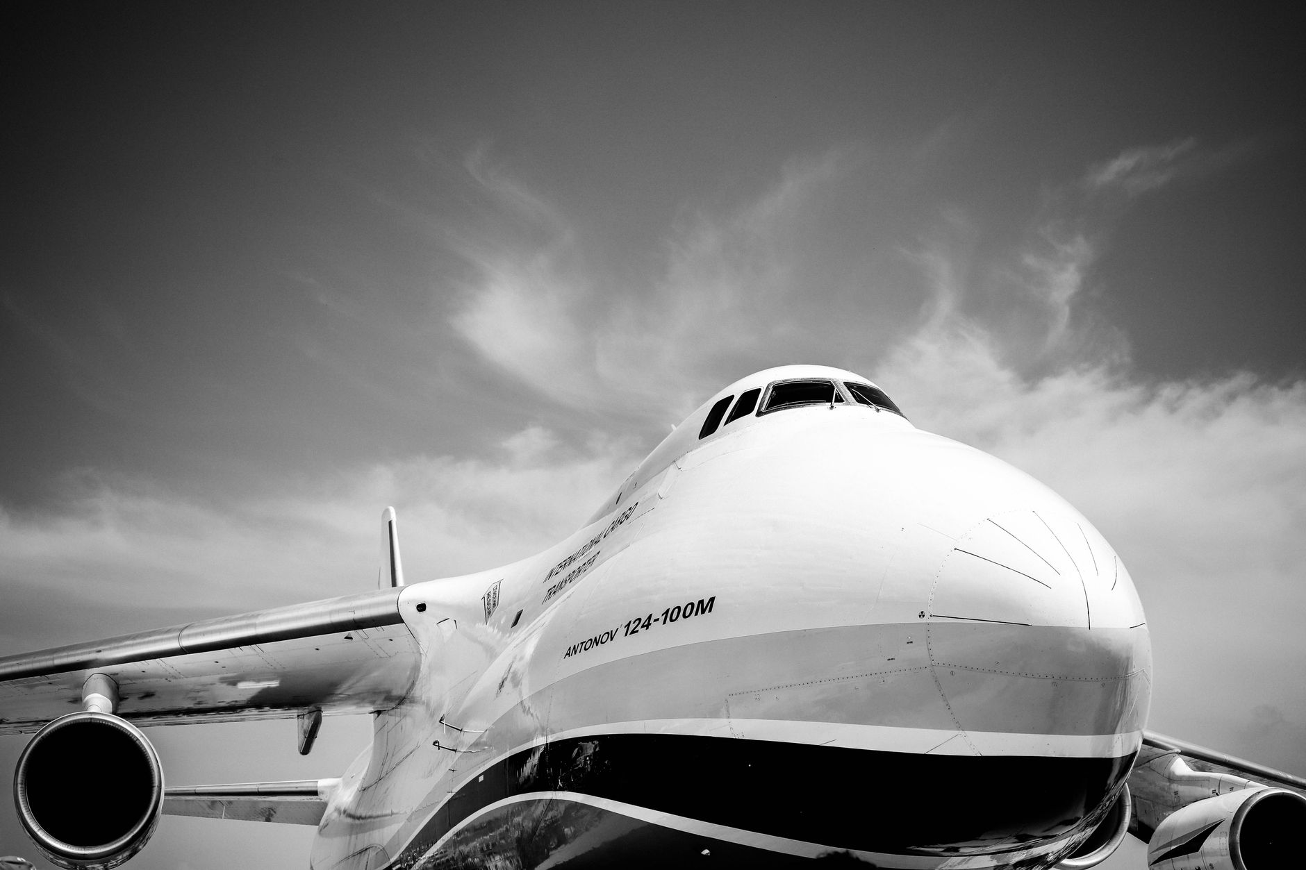 Grayscale Close-up Photo of Front of Airplane