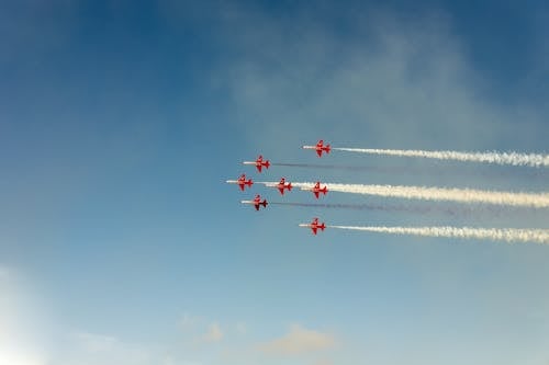 Free Red Planes Performing Airshow Stock Photo
