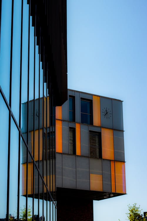 Black and Orange Glass Curtain Building