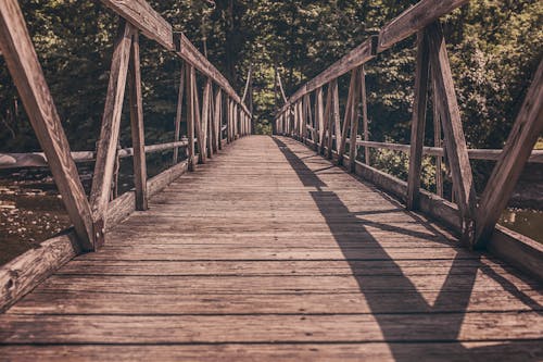 Alley Photography of Brown Wooden Bridge