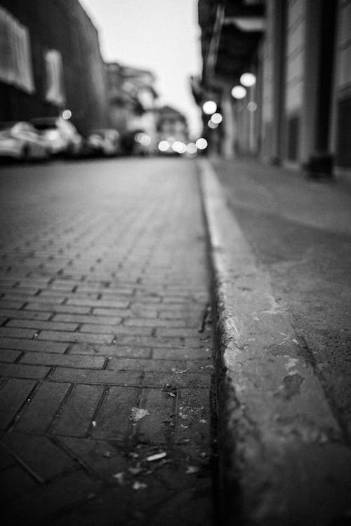 Grayscale Photography Of Sidewalk