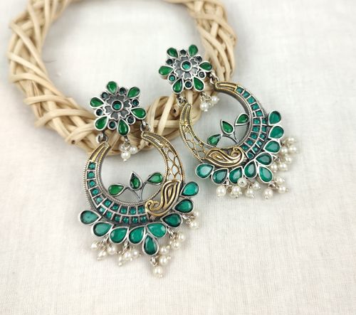 Free dual tone earrings || half moon earrings Stock Photo