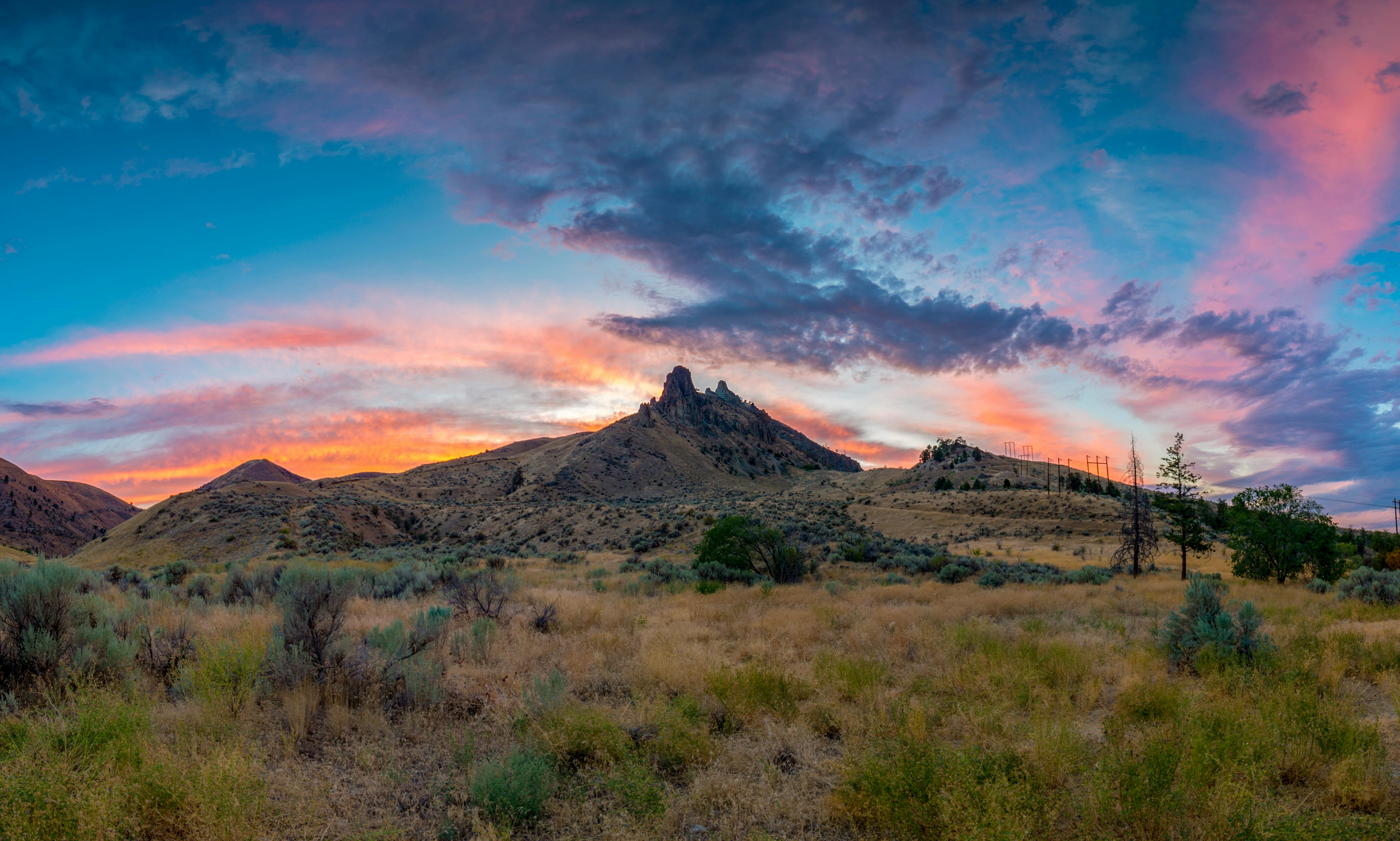 grassland with view of sunset