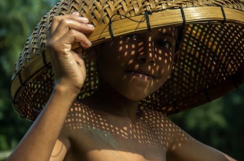 Woman Wearing Bamboo Hat 
