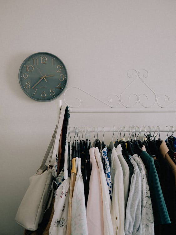 Clothes Hanging on a Rack 