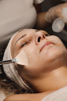 Close-up of a woman receiving a relaxing skincare treatment at a spa in Istanbul.