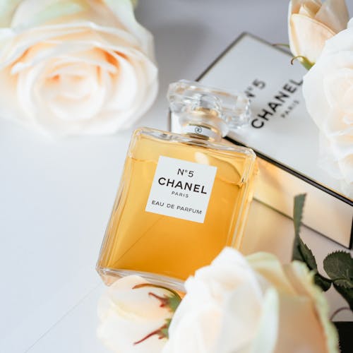 Chanel no 5 perfume bottle with roses