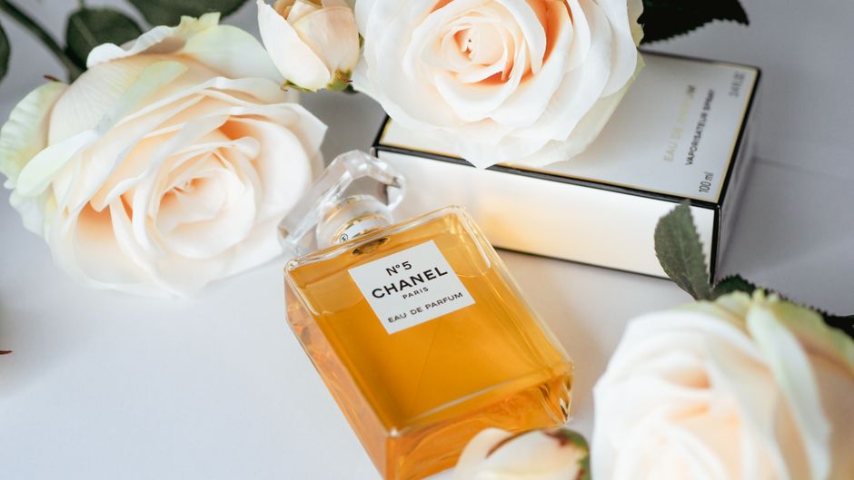Designer-inspired fragrance bottles including Flowerbomb and Chanel No. 5 on sale for $14 at the sto
