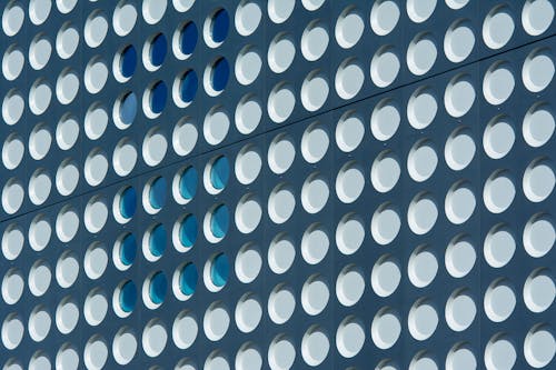 A close up of a building with blue dots