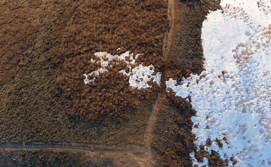 Spectacular Grand Moab, Scenic Heli Tour - 60 Minutes Review: The Ultimate Utah Helicopter Experience Review 2026 - Aerial view of a snow-dusted countryside landscape near Salt Lake City during winter.