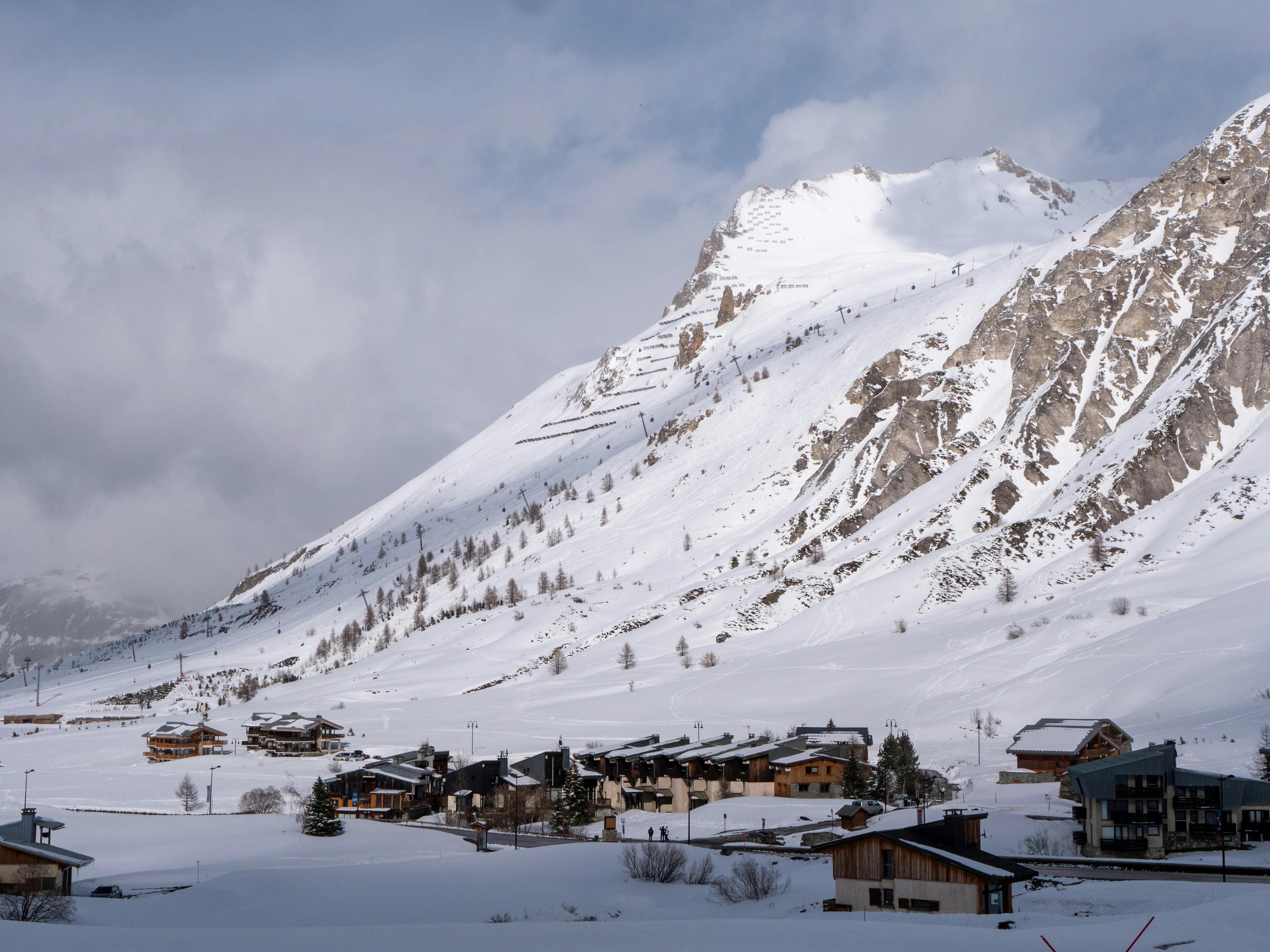 Prescription Goggle Inserts - Picturesque snowy village nestled in French Alps, Tignes in winter.