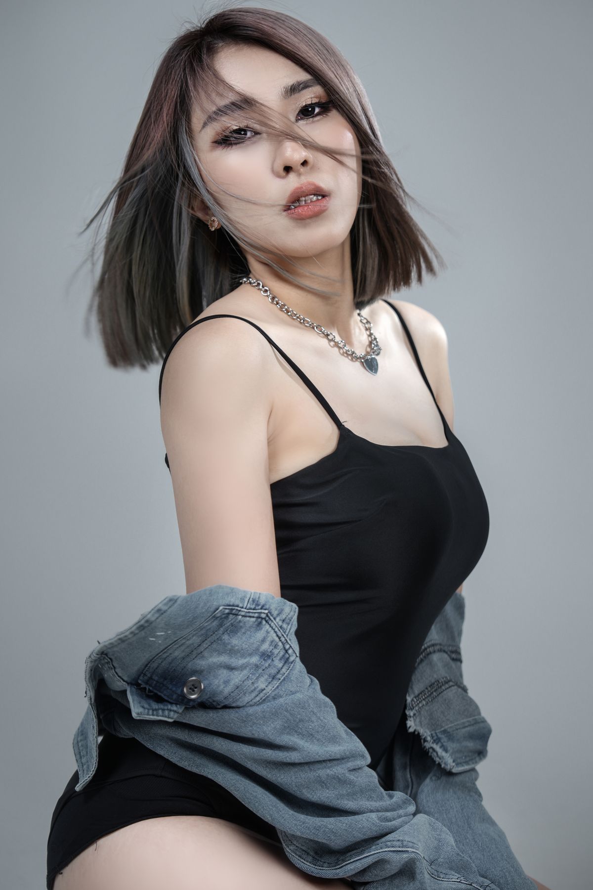 Elegant studio portrait of a young woman