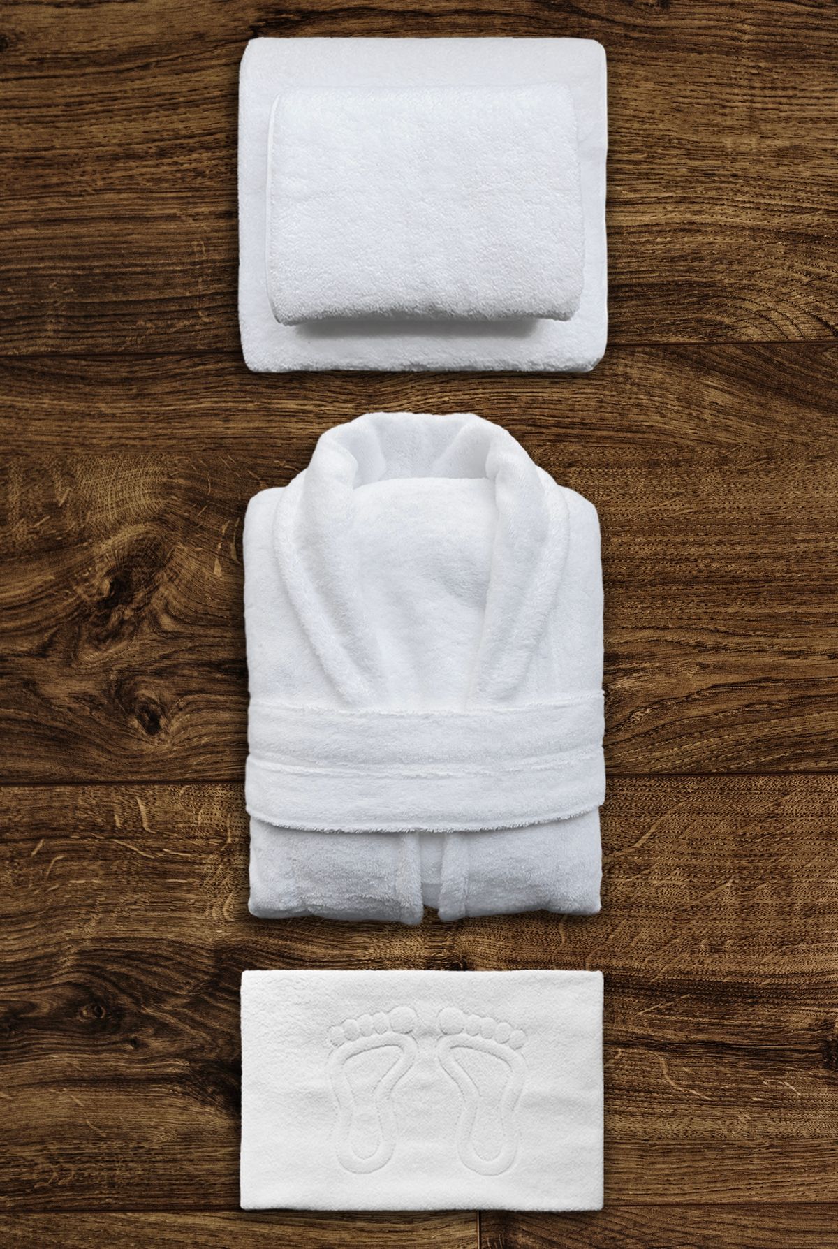 Neatly folded linen textiles — generic stock, placeholder pending real photography of the actual tea towels