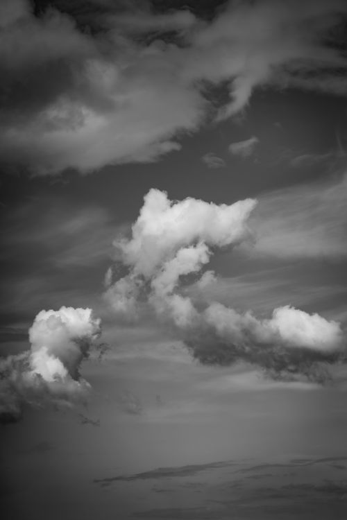 Black and White Photo of the Sky with Clouds · Free Stock Photo