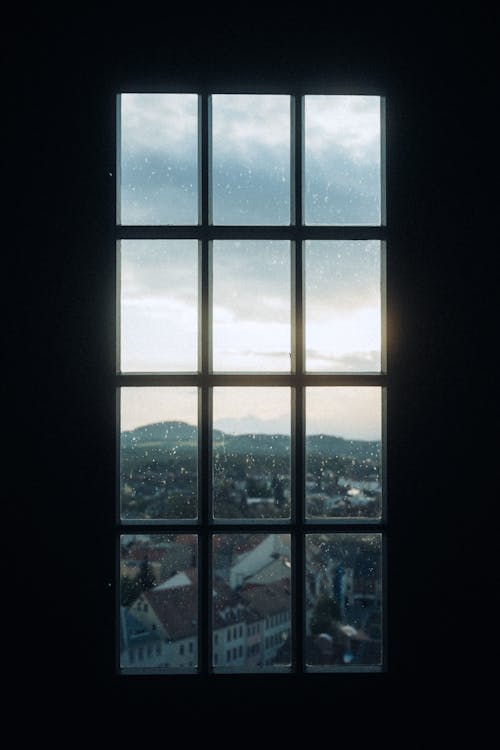 A window with a view of a city