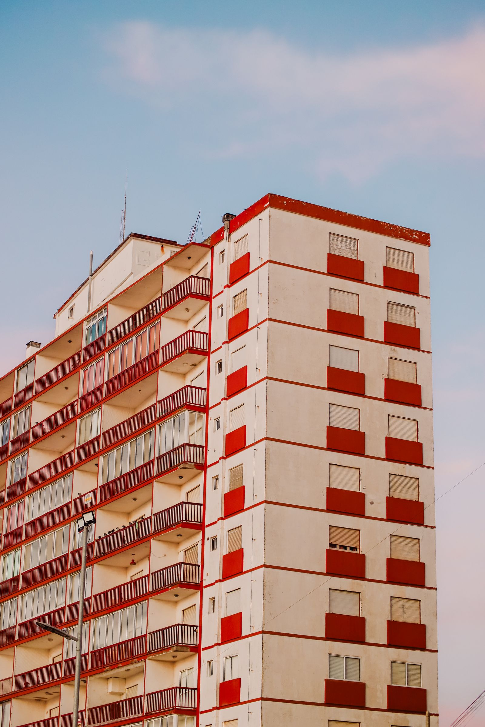 Luxury apartment building facade at golden hour, Lagos