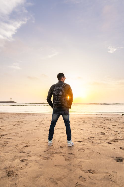 Man Standing on Beach