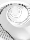 White Spiral Stairs With Black Metal Railings