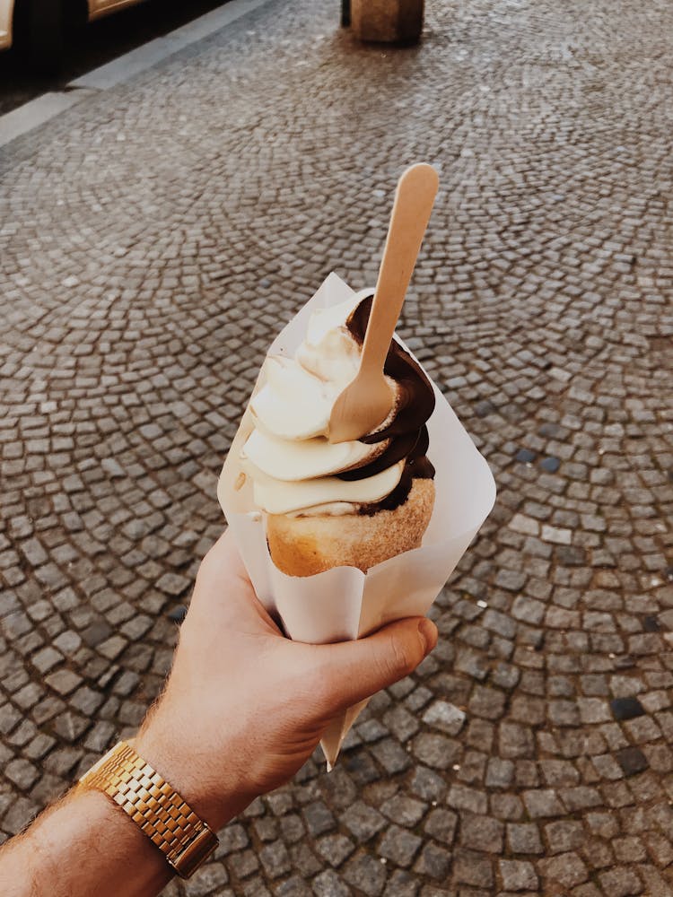 Person Holding Soft Serve Ice Cream