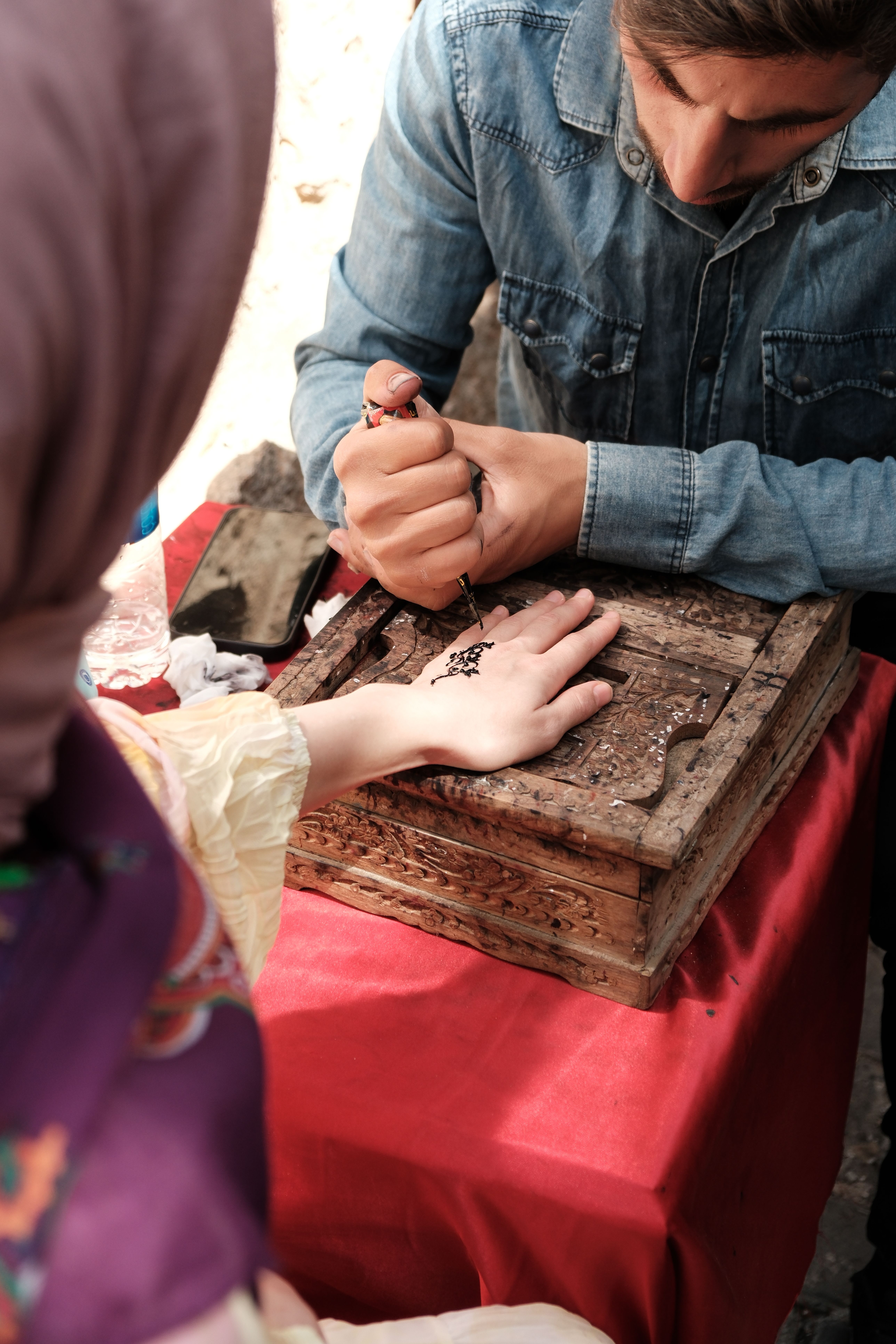 Man Tattooing Woman Hand with Ink · Free Stock Photo
