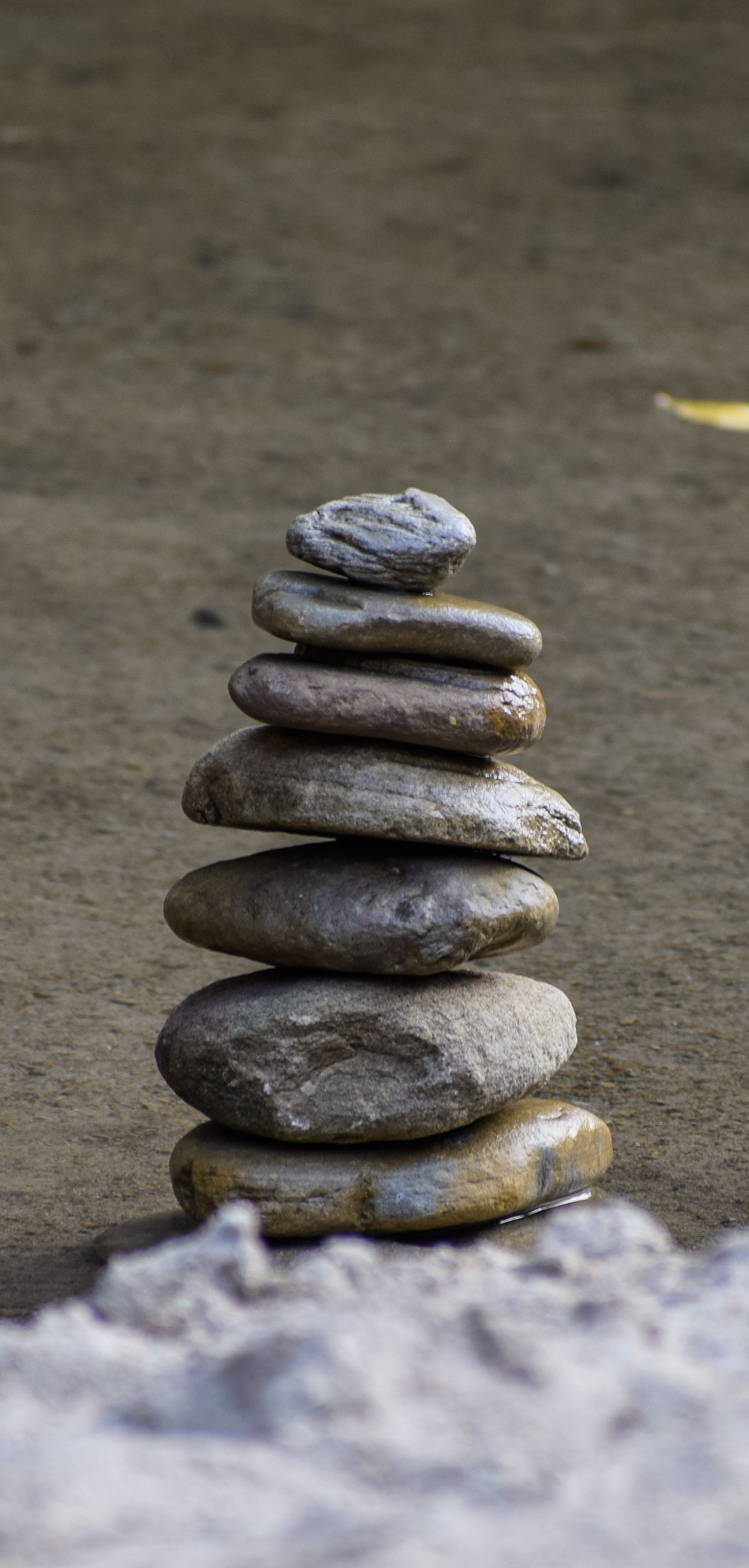 A stack of rocks on a beach · Free Stock Photo
