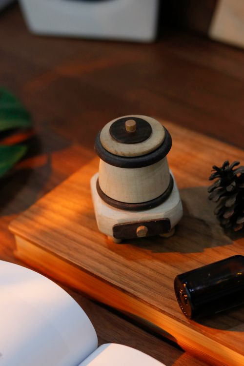 Free Handcrafted Wooden Coal-Stove Aroma Diffuser Stock Photo
