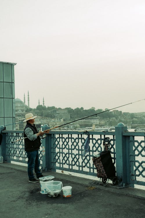 Kostenloses Stock Foto zu angelrute, blau, brücke