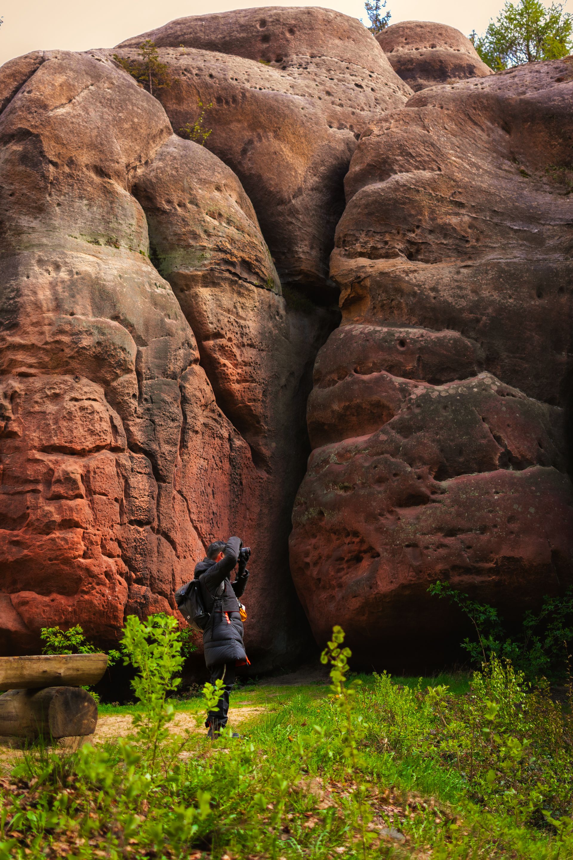 Hiker Photographing a Rock Face · Free Stock Photo