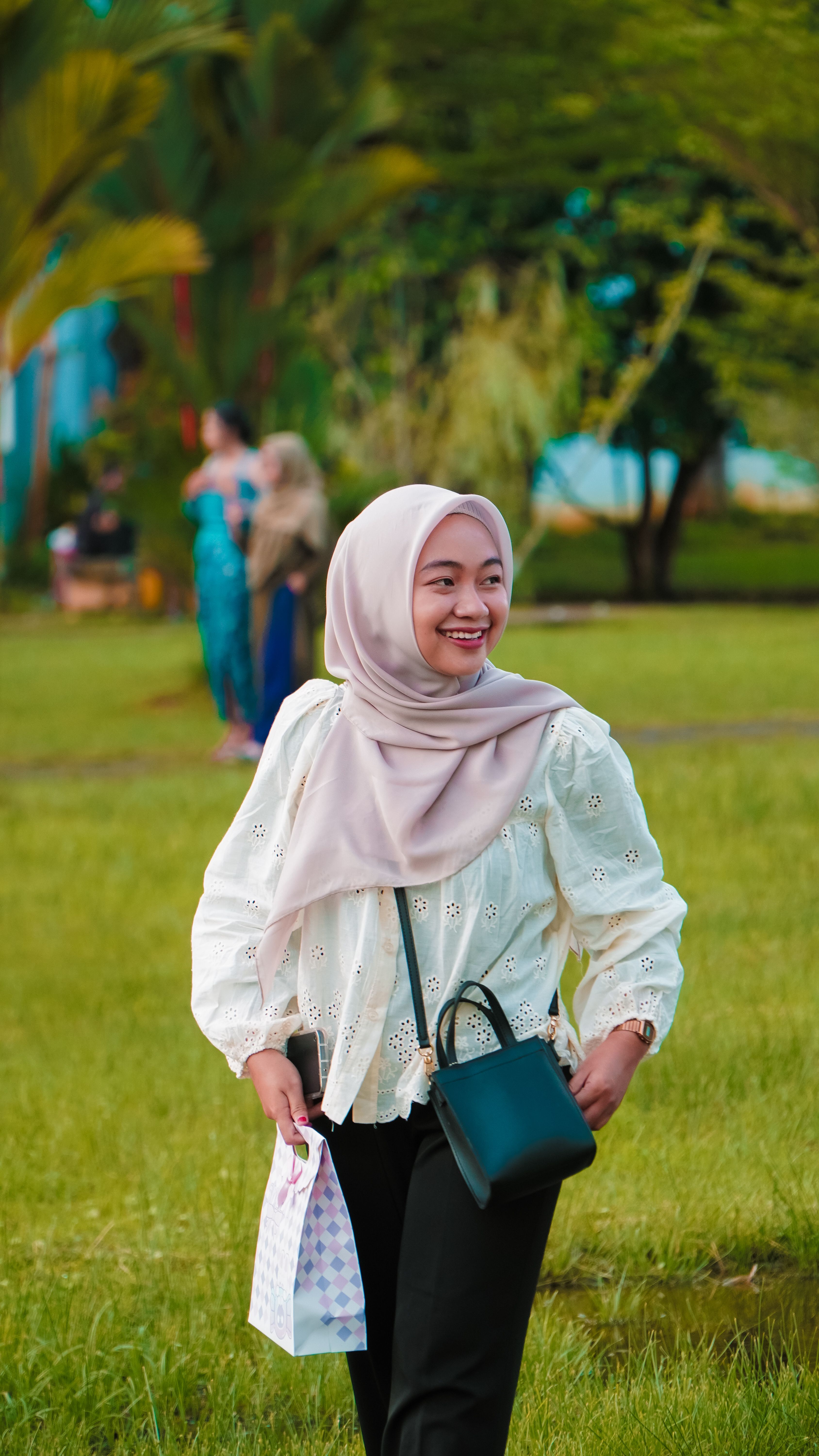 Portrait of a Young Woman Wearing a Headscarf · Free Stock Photo