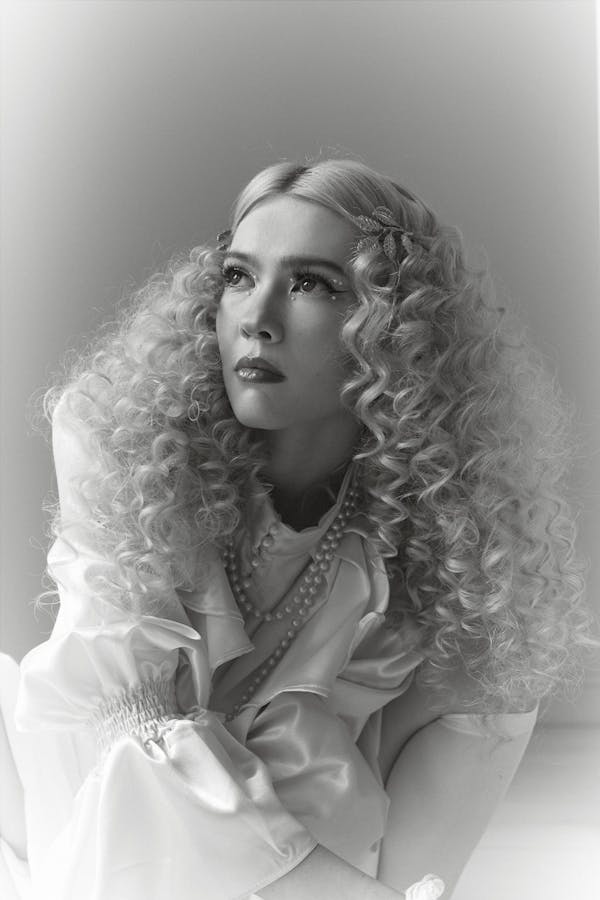 Glamorous Black woman in wig