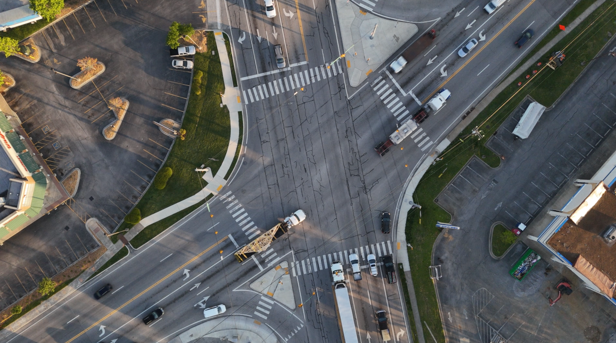High Raffic Intersection Cars at Intersection in City · Free Stock Photo