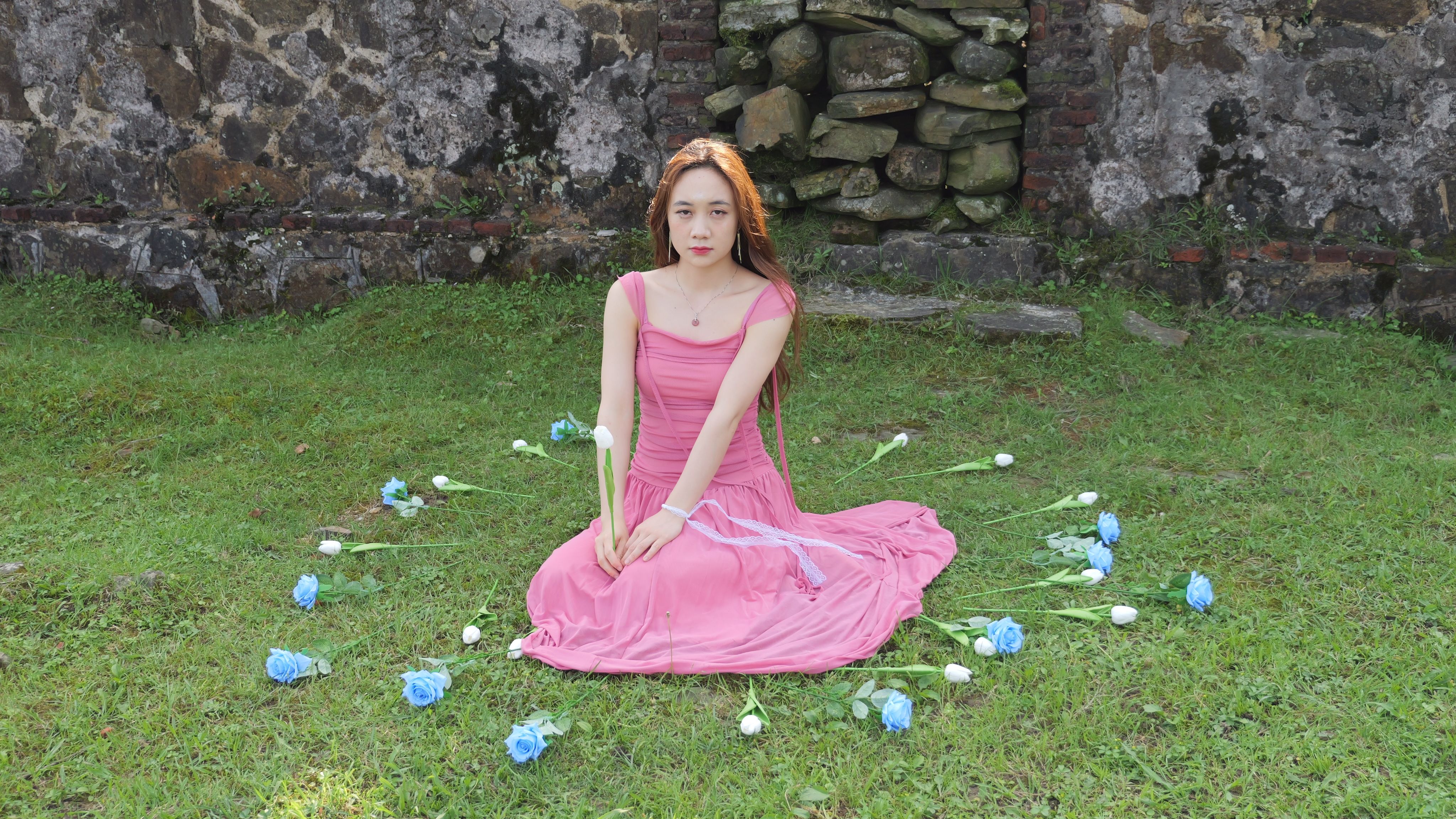 Woman Wearing Pink Dress and Posing on a Grass · Free Stock Photo