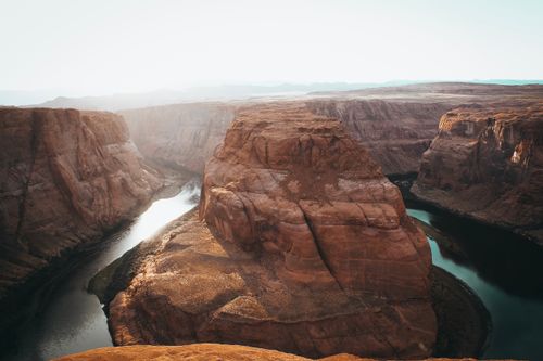 Free A breathtaking view of the Horseshoe Bend with Colorado River meander, highlighting natural erosion and rock formations. Stock Photo