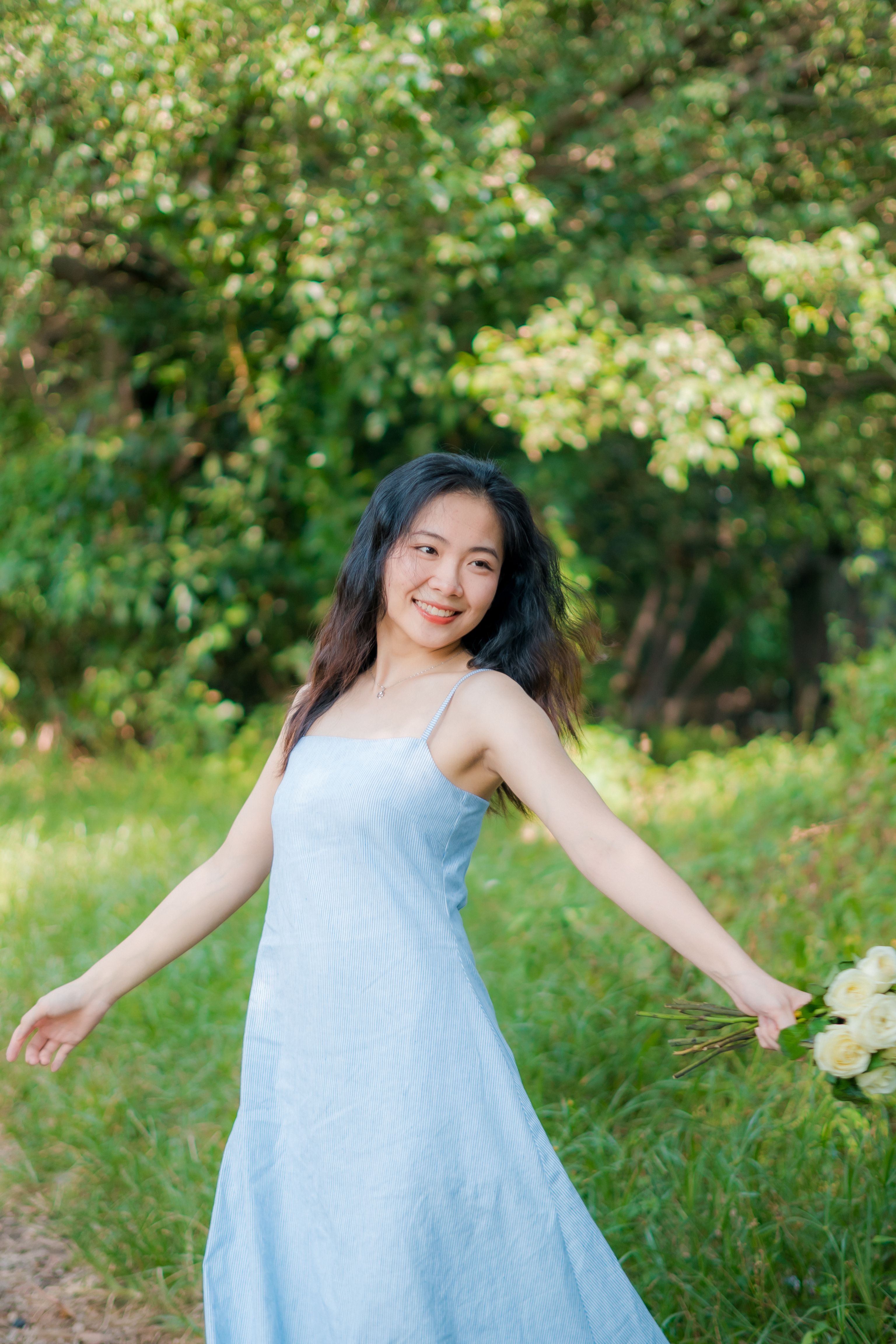 Smiling Woman in Blue Dress · Free Stock Photo