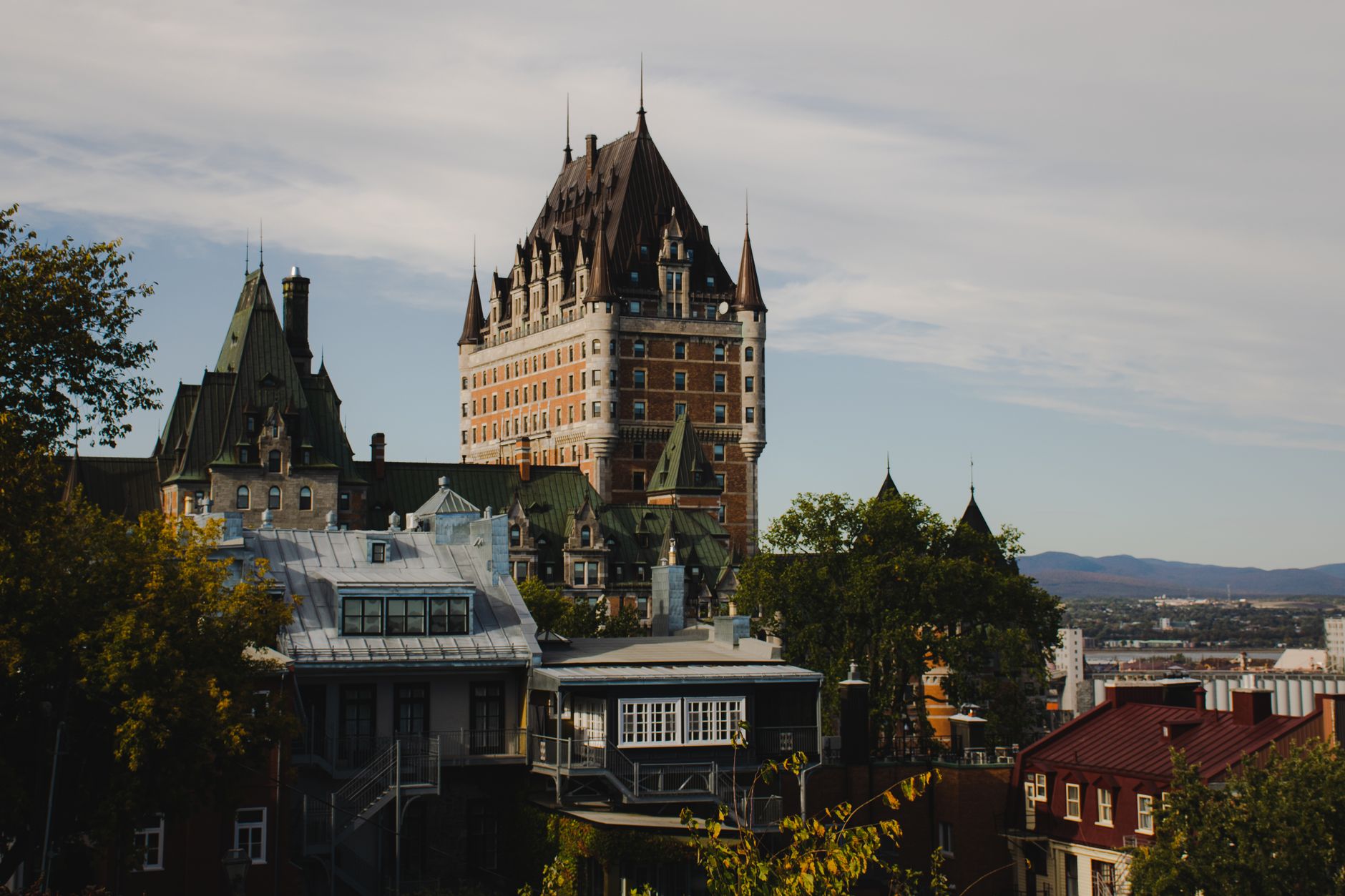 Stunning view of Château Frontenac above historic Québec City under a clear sky. Related image for Hospitality in Canada: How Brands Can Improve Performance.