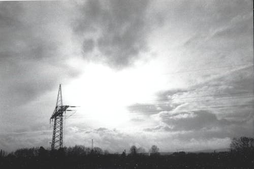 A black and white photo of a windmill