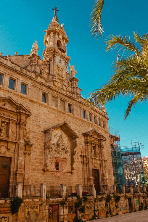 Free Stunning Gothic facade of Sant Joan del Mercat Church in Valencia, Spain under a clear blue sky. Stock Photo